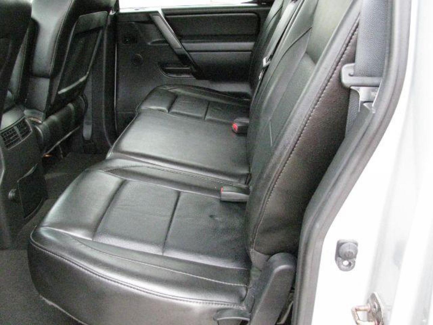 2012 Silver Nissan Titan SL (1N6BA0ED0CN) with an Endurance 5.6L V-8 DOHC engine, Automatic transmission, located at 2443 Albert Pike, Hot Springs, AR, 71913, (501) 623-6255, 34.492222, -93.109993 - Photo#7