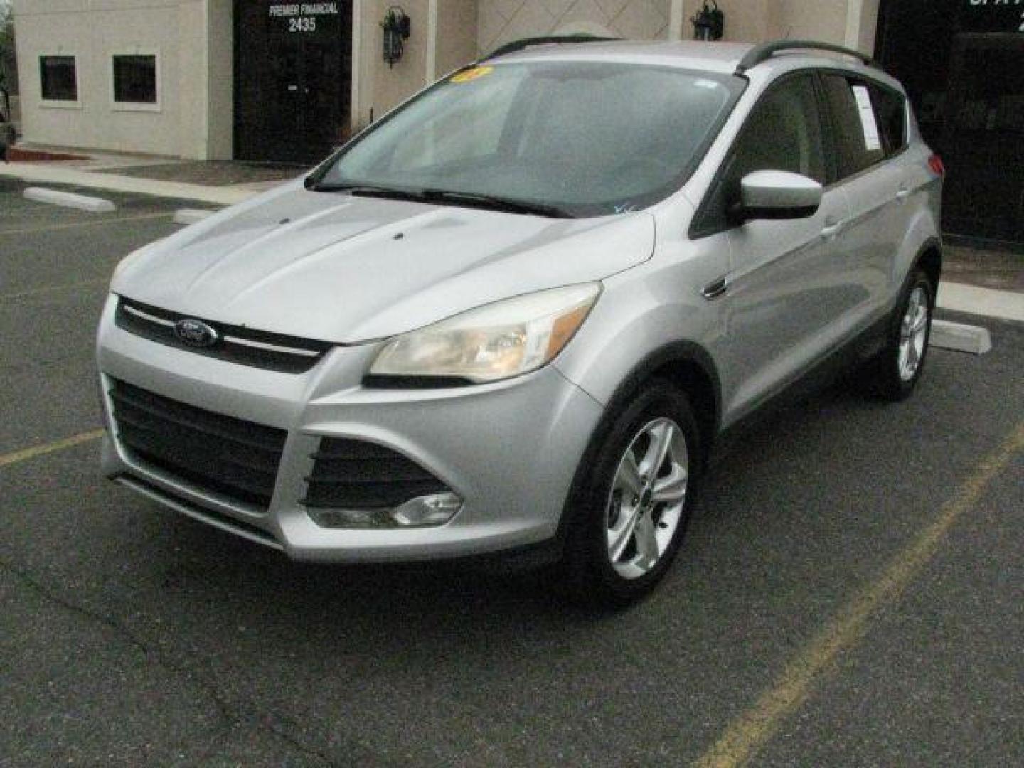 2016 Silver Ford Escape SE (1FMCU9G92GU) with an EcoBoost 2L I-4 gasoline direct injection engine, Automatic transmission, located at 2443 Albert Pike, Hot Springs, AR, 71913, (501) 623-6255, 34.492222, -93.109993 - Photo#0