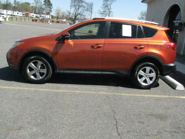 2015 Orange Toyota RAV4 XLE (JTMWFREV8FD) with an 2.5L I-4 DOHC engine, Automatic transmission, located at 2443 Albert Pike, Hot Springs, AR, 71913, (501) 623-6255, 34.492222, -93.109993 - Photo#1
