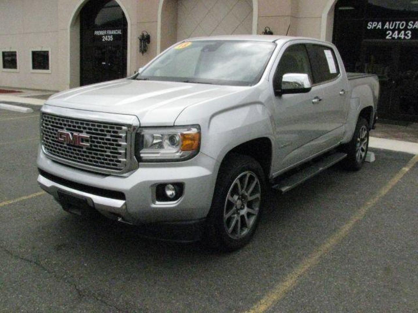 2018 Silver GMC Canyon Denali (1GTG6EEN9J1) with an 3.6L V-6 gasoline direct injection engine, Automatic transmission, located at 2443 Albert Pike, Hot Springs, AR, 71913, (501) 623-6255, 34.492222, -93.109993- Photo#0