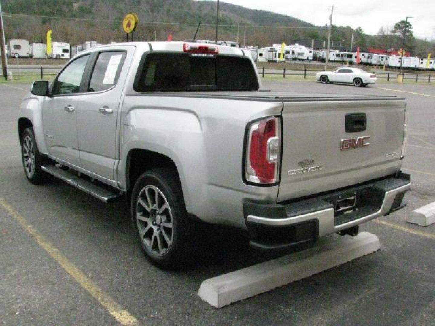 2018 Silver GMC Canyon Denali (1GTG6EEN9J1) with an 3.6L V-6 gasoline direct injection engine, Automatic transmission, located at 2443 Albert Pike, Hot Springs, AR, 71913, (501) 623-6255, 34.492222, -93.109993- Photo#2