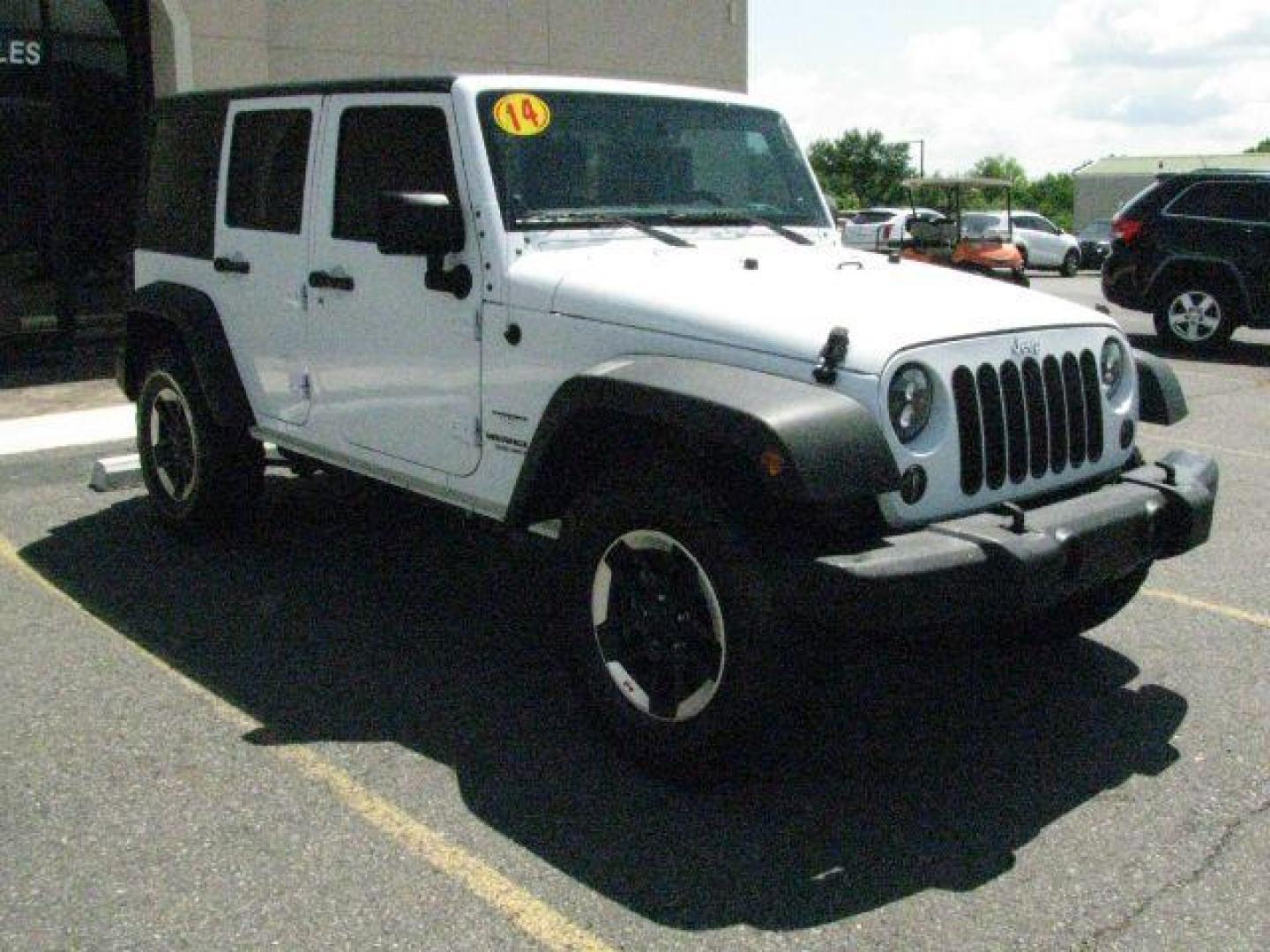 2014 White Jeep Wrangler Unlimited Sport (1C4BJWDG0EL) with an 3.6L V-6 DOHC engine, Automatic transmission, located at 2443 Albert Pike, Hot Springs, AR, 71913, (501) 623-6255, 34.492222, -93.109993- Photo#5