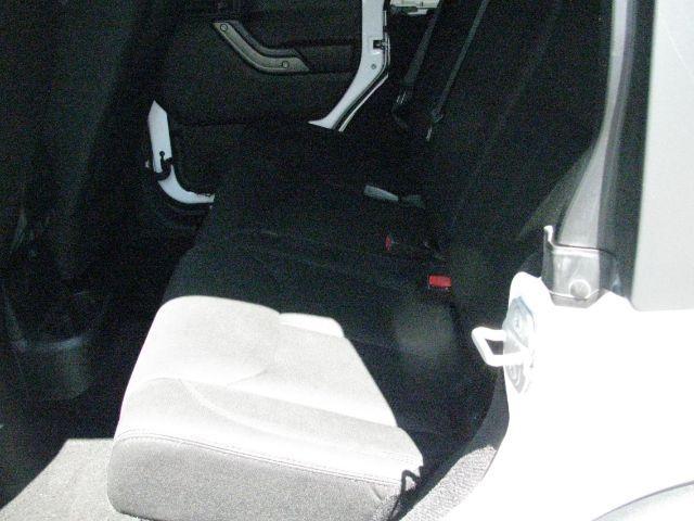 2014 White Jeep Wrangler Unlimited Sport (1C4BJWDG0EL) with an 3.6L V-6 DOHC engine, Automatic transmission, located at 2443 Albert Pike, Hot Springs, AR, 71913, (501) 623-6255, 34.492222, -93.109993- Photo#7