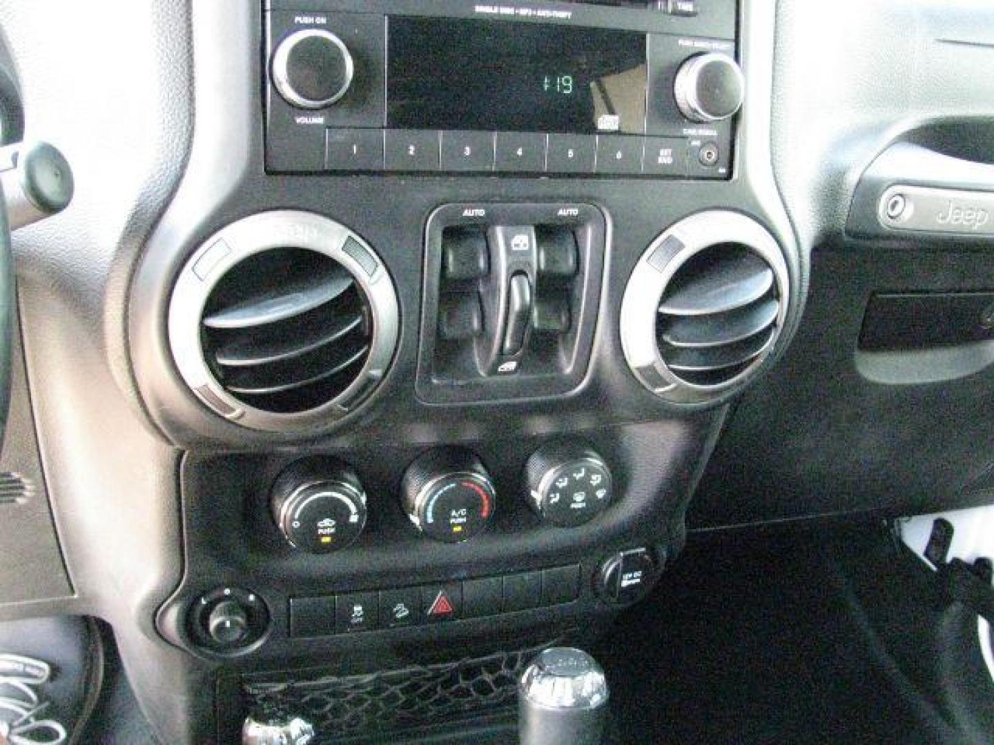 2014 White Jeep Wrangler Unlimited Sport (1C4BJWDG0EL) with an 3.6L V-6 DOHC engine, Automatic transmission, located at 2443 Albert Pike, Hot Springs, AR, 71913, (501) 623-6255, 34.492222, -93.109993- Photo#9