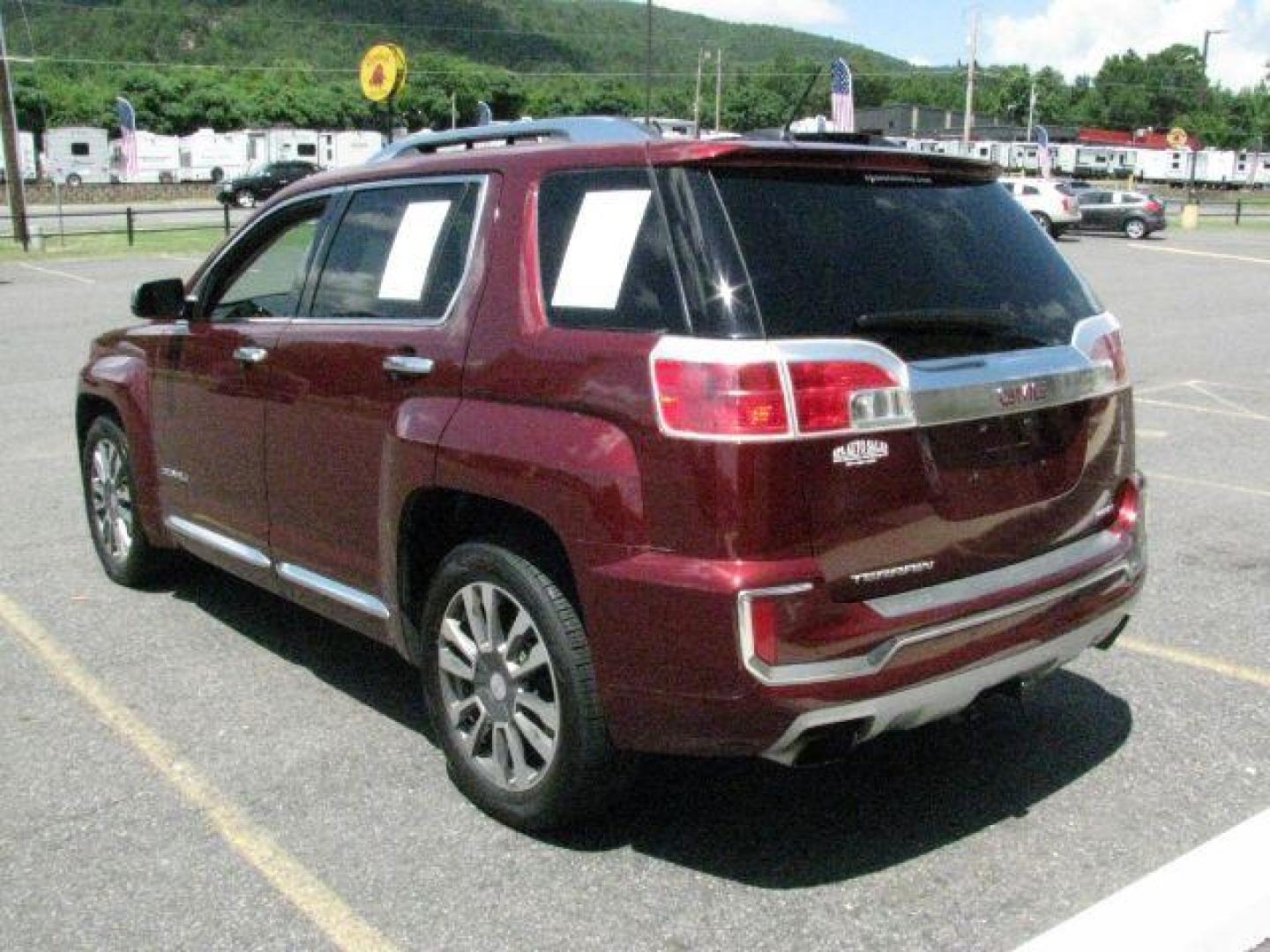 2016 Maroon GMC Terrain Denali (2GKFLVE38G6) with an 3.6L V-6 gasoline direct injection engine, Automatic transmission, located at 2443 Albert Pike, Hot Springs, AR, 71913, (501) 623-6255, 34.492222, -93.109993- Photo#2