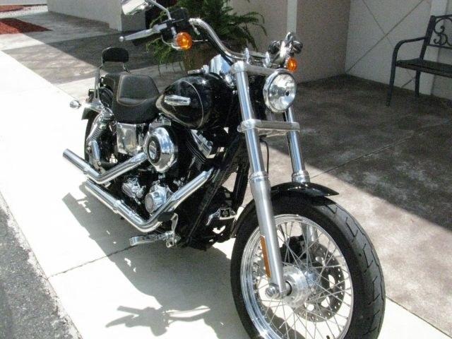 2010 Black Harley-Davidson Dyna Super Glide Custom Dyna Super Glide (1HD1GV419AC) with an 1584cc engine, Manual transmission, located at 2443 Albert Pike, Hot Springs, AR, 71913, (501) 623-6255, 34.492222, -93.109993- Photo#1