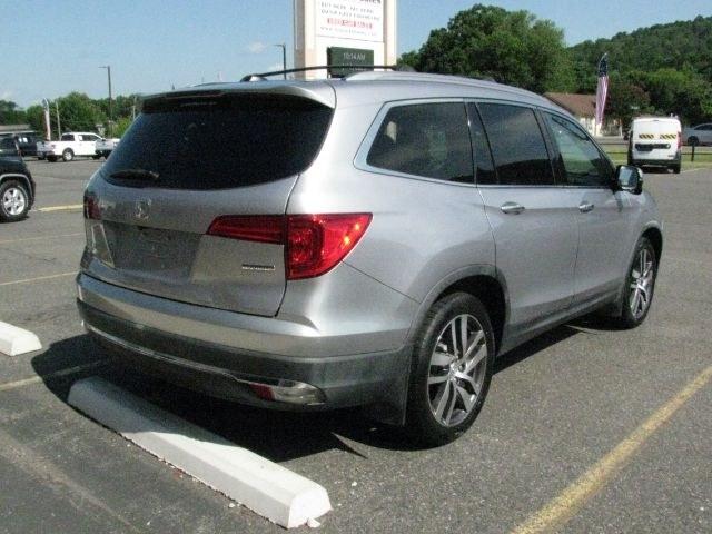 2017 Silver Honda Pilot Touring (5FNYF5H9XHB) with an 3.5L V-6 gasoline direct injection engine, Automatic transmission, located at 2443 Albert Pike, Hot Springs, AR, 71913, (501) 623-6255, 34.492222, -93.109993- Photo#2