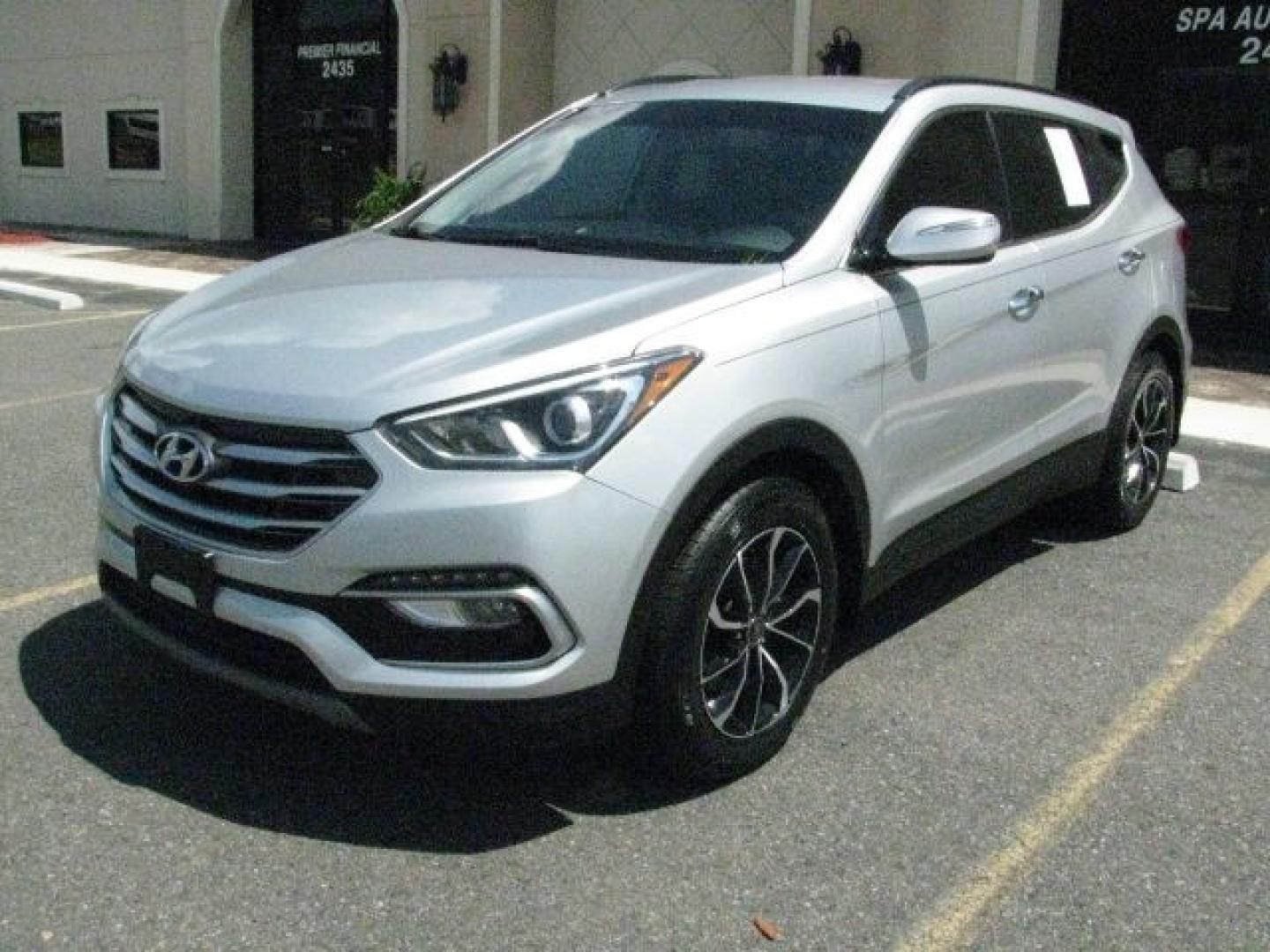 2018 Silver Hyundai Santa Fe Sport 2.0T (5XYZU4LAXJG) with an Theta II 2L I-4 gasoline direct injection engine, Automatic transmission, located at 2443 Albert Pike, Hot Springs, AR, 71913, (501) 623-6255, 34.492222, -93.109993- Photo#0