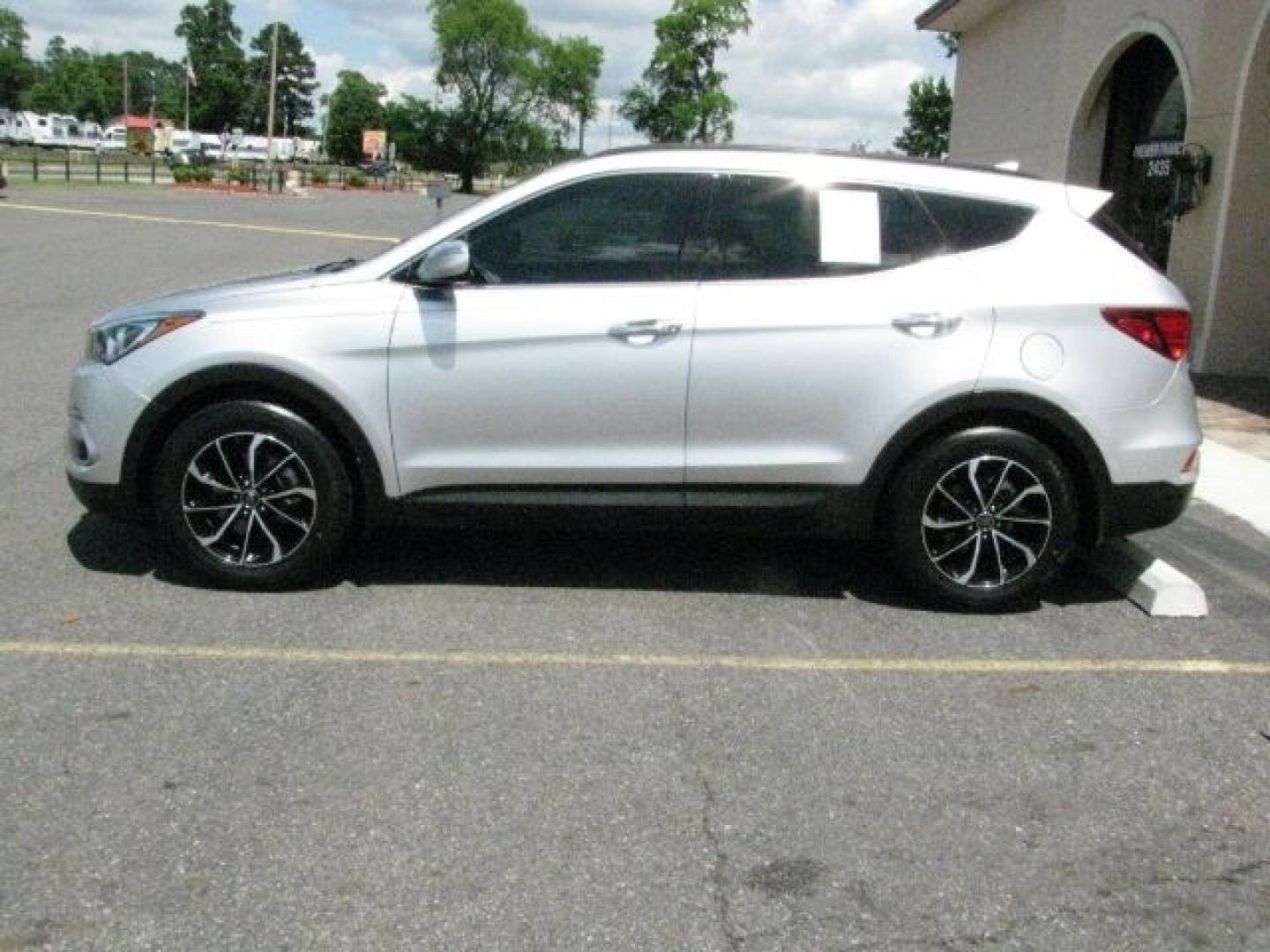 2018 Silver Hyundai Santa Fe Sport 2.0T (5XYZU4LAXJG) with an Theta II 2L I-4 gasoline direct injection engine, Automatic transmission, located at 2443 Albert Pike, Hot Springs, AR, 71913, (501) 623-6255, 34.492222, -93.109993- Photo#1