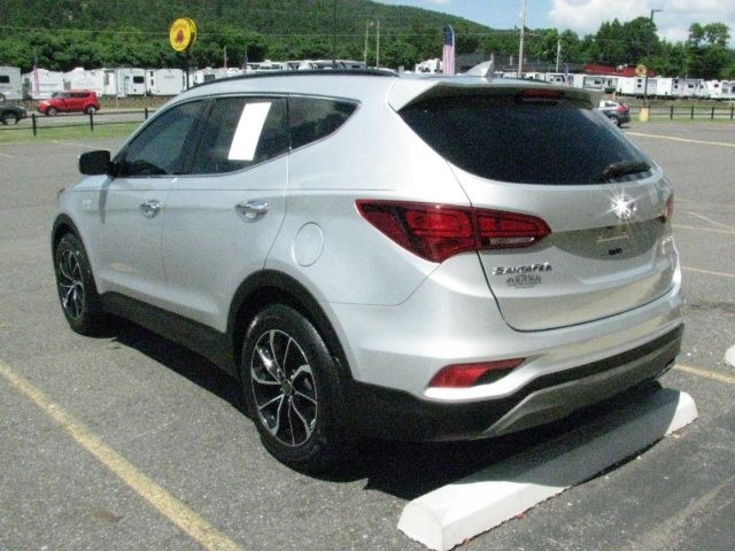 2018 Silver Hyundai Santa Fe Sport 2.0T (5XYZU4LAXJG) with an Theta II 2L I-4 gasoline direct injection engine, Automatic transmission, located at 2443 Albert Pike, Hot Springs, AR, 71913, (501) 623-6255, 34.492222, -93.109993- Photo#2