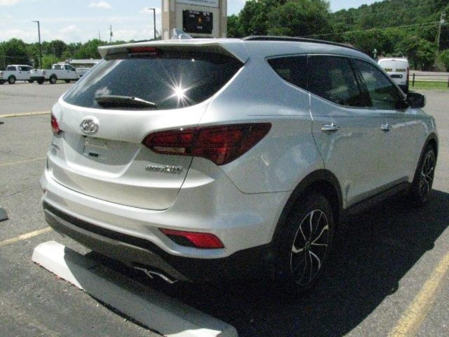 2018 Silver Hyundai Santa Fe Sport 2.0T (5XYZU4LAXJG) with an Theta II 2L I-4 gasoline direct injection engine, Automatic transmission, located at 2443 Albert Pike, Hot Springs, AR, 71913, (501) 623-6255, 34.492222, -93.109993- Photo#3