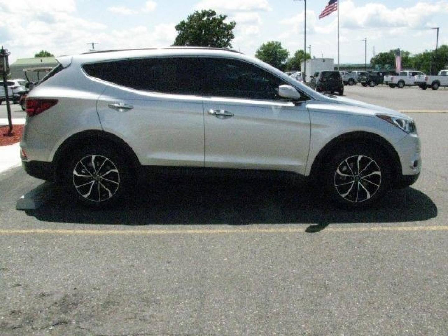 2018 Silver Hyundai Santa Fe Sport 2.0T (5XYZU4LAXJG) with an Theta II 2L I-4 gasoline direct injection engine, Automatic transmission, located at 2443 Albert Pike, Hot Springs, AR, 71913, (501) 623-6255, 34.492222, -93.109993- Photo#4