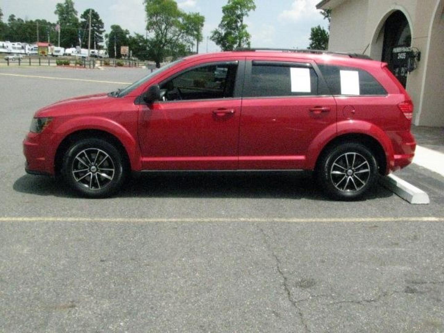 2018 Red Dodge Journey SE (3C4PDCAB5JT) with an Tigershark MultiAir 2.4L I-4 DOHC engine, Automatic transmission, located at 2443 Albert Pike, Hot Springs, AR, 71913, (501) 623-6255, 34.492222, -93.109993- Photo#1