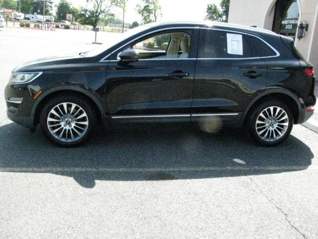 2016 Black Lincoln MKC Reserve (5LMCJ3C9XGU) with an EcoBoost 2L I-4 gasoline direct injection engine, Automatic transmission, located at 2443 Albert Pike, Hot Springs, AR, 71913, (501) 623-6255, 34.492222, -93.109993- Photo#4