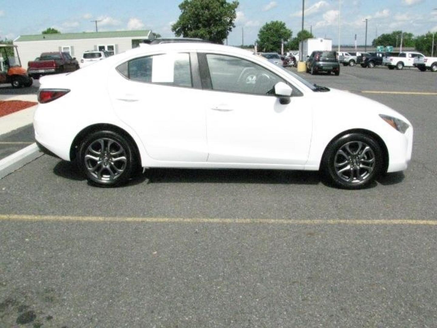 2019 White Toyota Yaris Sedan LE (3MYDLBYV1KY) with an 1.5L I-4 gasoline direct injection engine, Automatic transmission, located at 2443 Albert Pike, Hot Springs, AR, 71913, (501) 623-6255, 34.492222, -93.109993- Photo#1