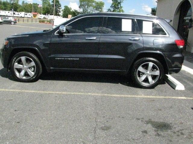 2014 Gray Jeep Grand Cherokee Overland (1C4RJFCT7EC) with an HEMI 5.7L V-8 variable valve control engine, Auto transmission, located at 2443 Albert Pike, Hot Springs, AR, 71913, (501) 623-6255, 34.492222, -93.109993- Photo#1