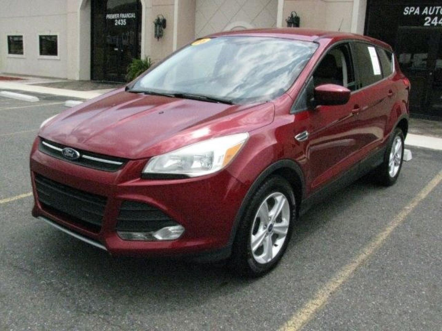 2016 Maroon Ford Escape SE (1FMCU0G77GU) with an Duratec 2.5L I-4 DOHC engine, Automatic transmission, located at 2443 Albert Pike, Hot Springs, AR, 71913, (501) 623-6255, 34.492222, -93.109993- Photo#0