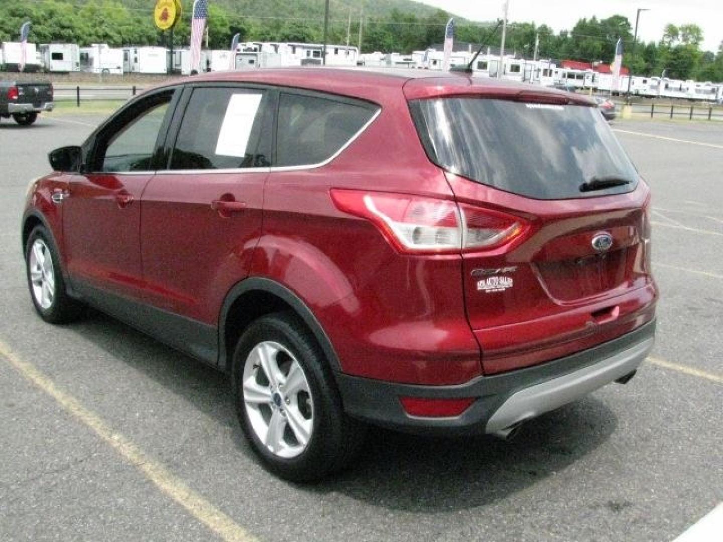 2016 Maroon Ford Escape SE (1FMCU0G77GU) with an Duratec 2.5L I-4 DOHC engine, Automatic transmission, located at 2443 Albert Pike, Hot Springs, AR, 71913, (501) 623-6255, 34.492222, -93.109993- Photo#2