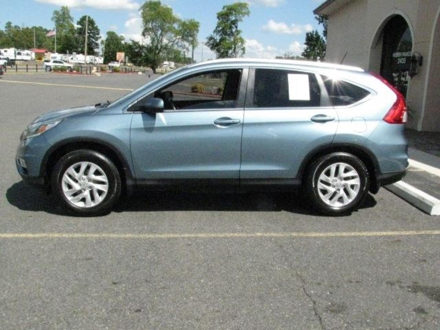 2015 Green Honda CR-V EX-L (2HKRM3H70FH) with an 2.4L I-4 gasoline direct injection engine, Automatic transmission, located at 2443 Albert Pike, Hot Springs, AR, 71913, (501) 623-6255, 34.492222, -93.109993- Photo#1
