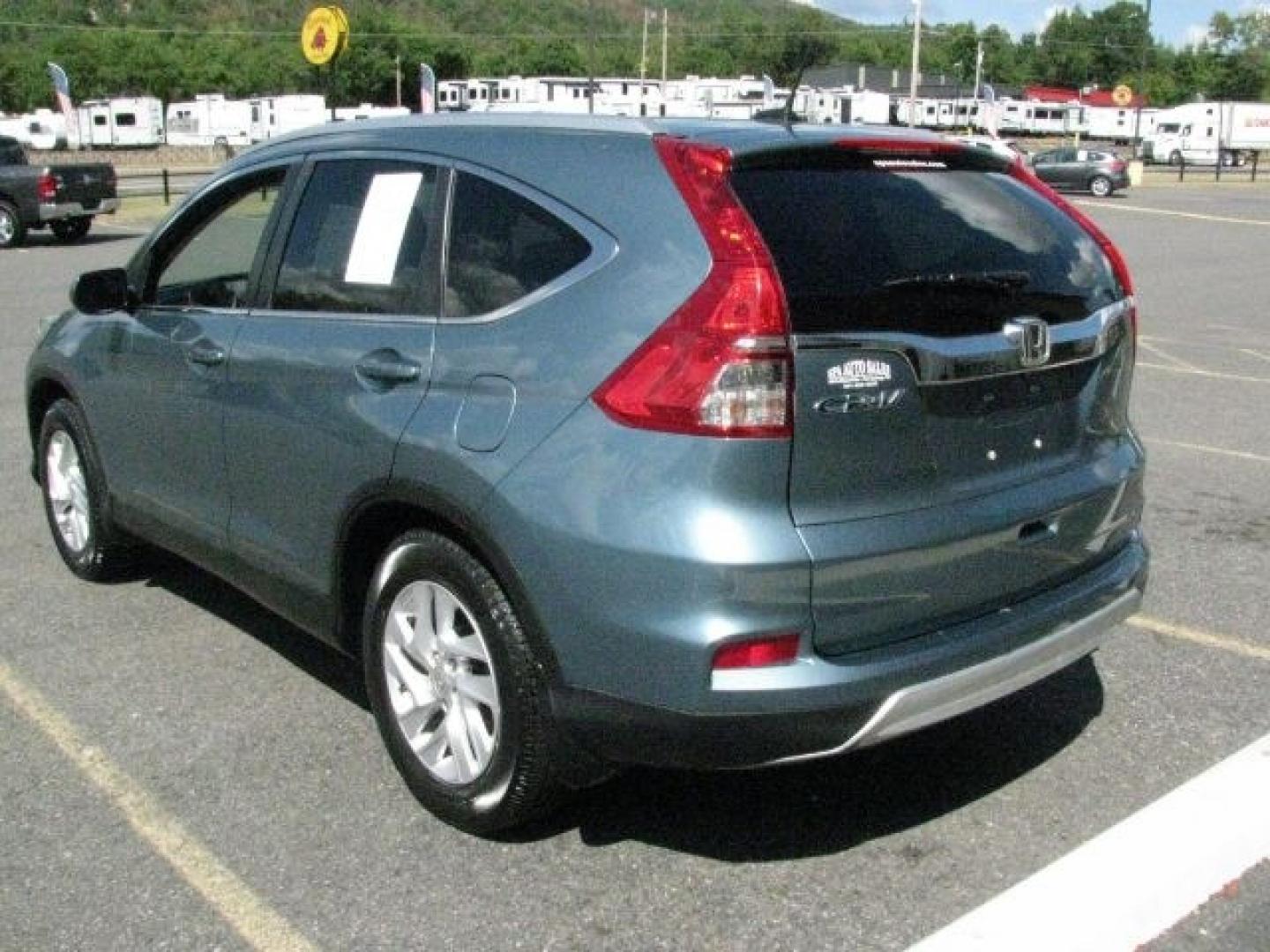 2015 Green Honda CR-V EX-L (2HKRM3H70FH) with an 2.4L I-4 gasoline direct injection engine, Automatic transmission, located at 2443 Albert Pike, Hot Springs, AR, 71913, (501) 623-6255, 34.492222, -93.109993- Photo#2