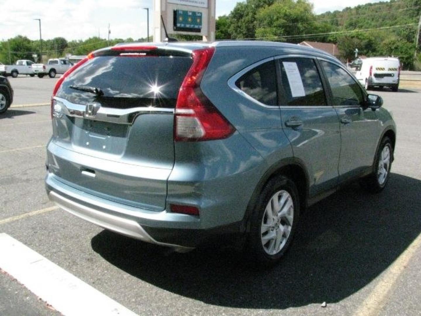 2015 Green Honda CR-V EX-L (2HKRM3H70FH) with an 2.4L I-4 gasoline direct injection engine, Automatic transmission, located at 2443 Albert Pike, Hot Springs, AR, 71913, (501) 623-6255, 34.492222, -93.109993- Photo#3
