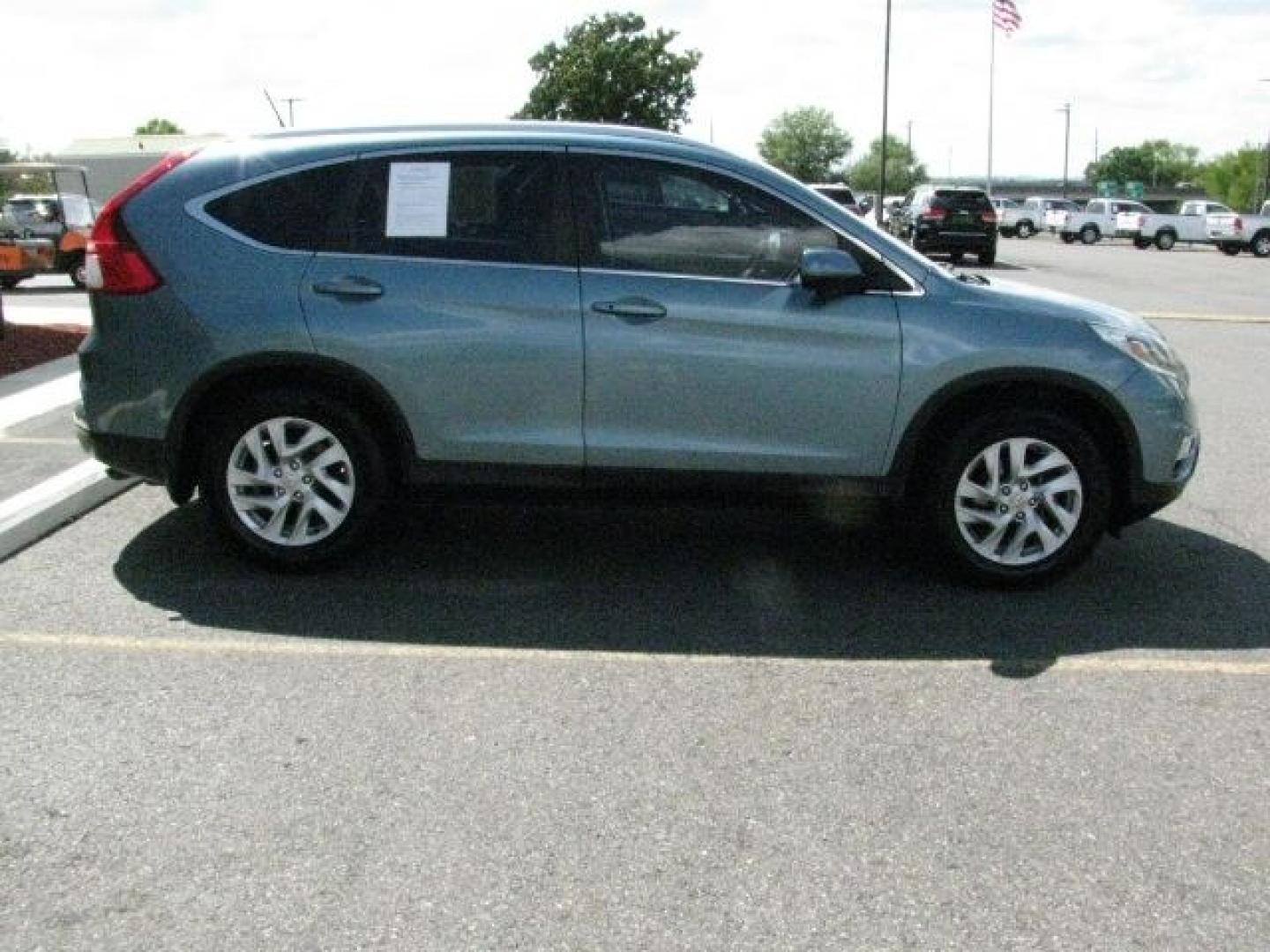2015 Green Honda CR-V EX-L (2HKRM3H70FH) with an 2.4L I-4 gasoline direct injection engine, Automatic transmission, located at 2443 Albert Pike, Hot Springs, AR, 71913, (501) 623-6255, 34.492222, -93.109993- Photo#4