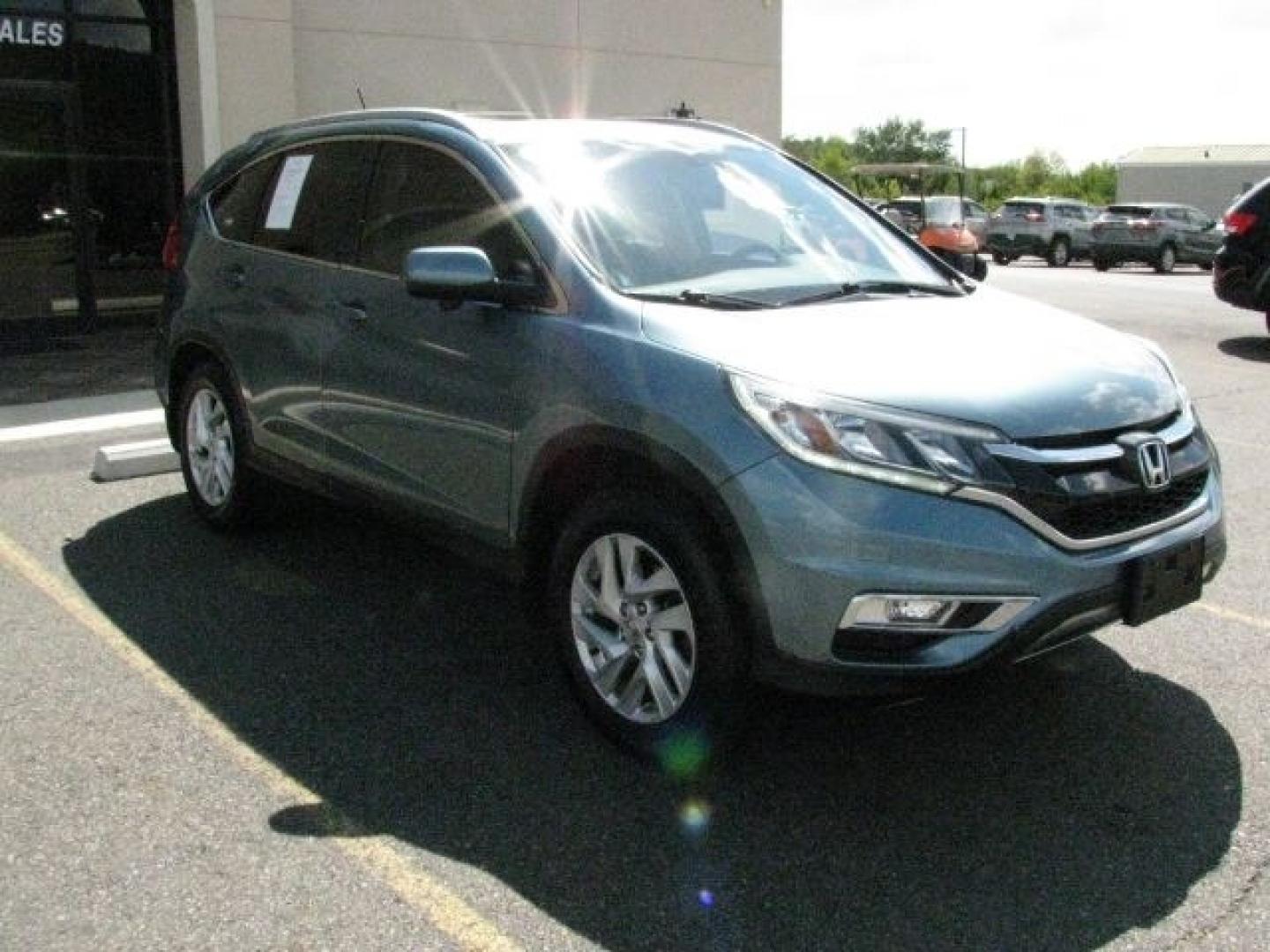 2015 Green Honda CR-V EX-L (2HKRM3H70FH) with an 2.4L I-4 gasoline direct injection engine, Automatic transmission, located at 2443 Albert Pike, Hot Springs, AR, 71913, (501) 623-6255, 34.492222, -93.109993- Photo#5