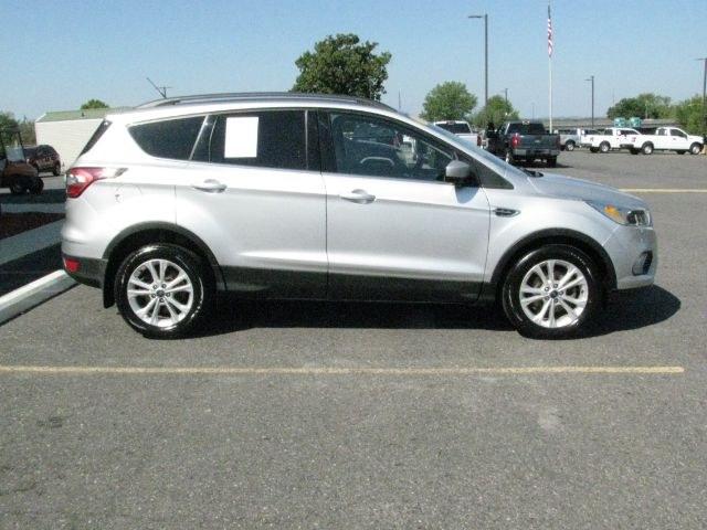 2018 Silver Ford Escape SE (1FMCU0GD3JU) with an EcoBoost 1.5L I-4 gasoline direct injection engine, automatic transmission, located at 2443 Albert Pike, Hot Springs, AR, 71913, (501) 623-6255, 34.492222, -93.109993- Photo#1