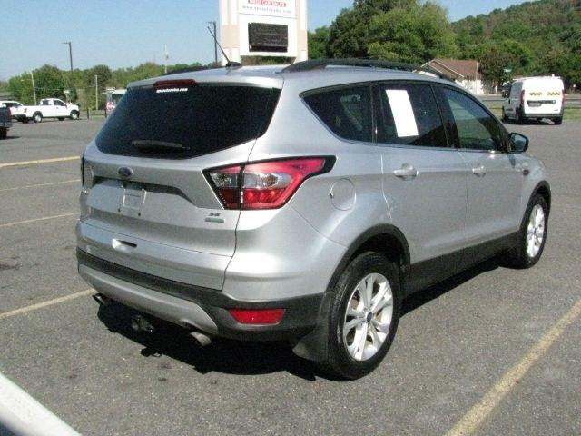 2018 Silver Ford Escape SE (1FMCU0GD3JU) with an EcoBoost 1.5L I-4 gasoline direct injection engine, automatic transmission, located at 2443 Albert Pike, Hot Springs, AR, 71913, (501) 623-6255, 34.492222, -93.109993- Photo#2