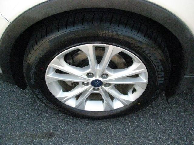 2018 Silver Ford Escape SE (1FMCU0GD3JU) with an EcoBoost 1.5L I-4 gasoline direct injection engine, automatic transmission, located at 2443 Albert Pike, Hot Springs, AR, 71913, (501) 623-6255, 34.492222, -93.109993- Photo#6